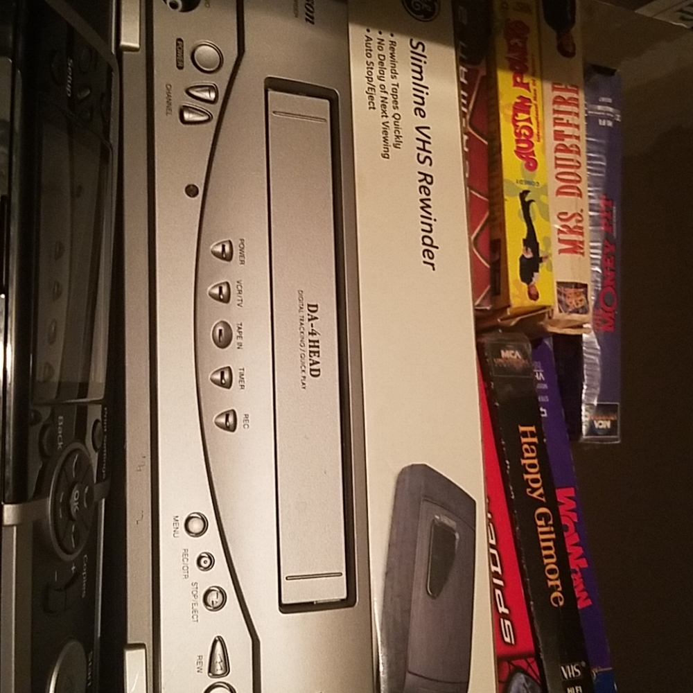 Vcr 7 tapes and rewinder